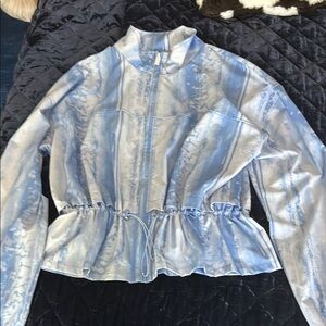 Travis Mathew Blue Bomber Jacket with Modern Design